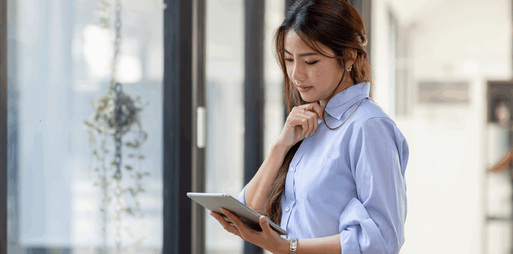 A person looking down at an iPad.