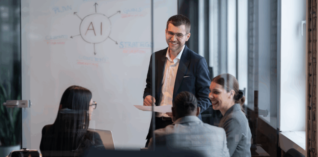 A group of coworkers discussing AI at a boardroom table.