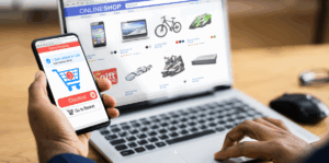 Person shopping on an ecommerce store on their laptop and on their phone.
