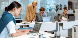 People working in an open office set up.